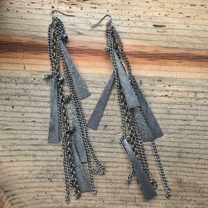 Dangly earrings, silver color.